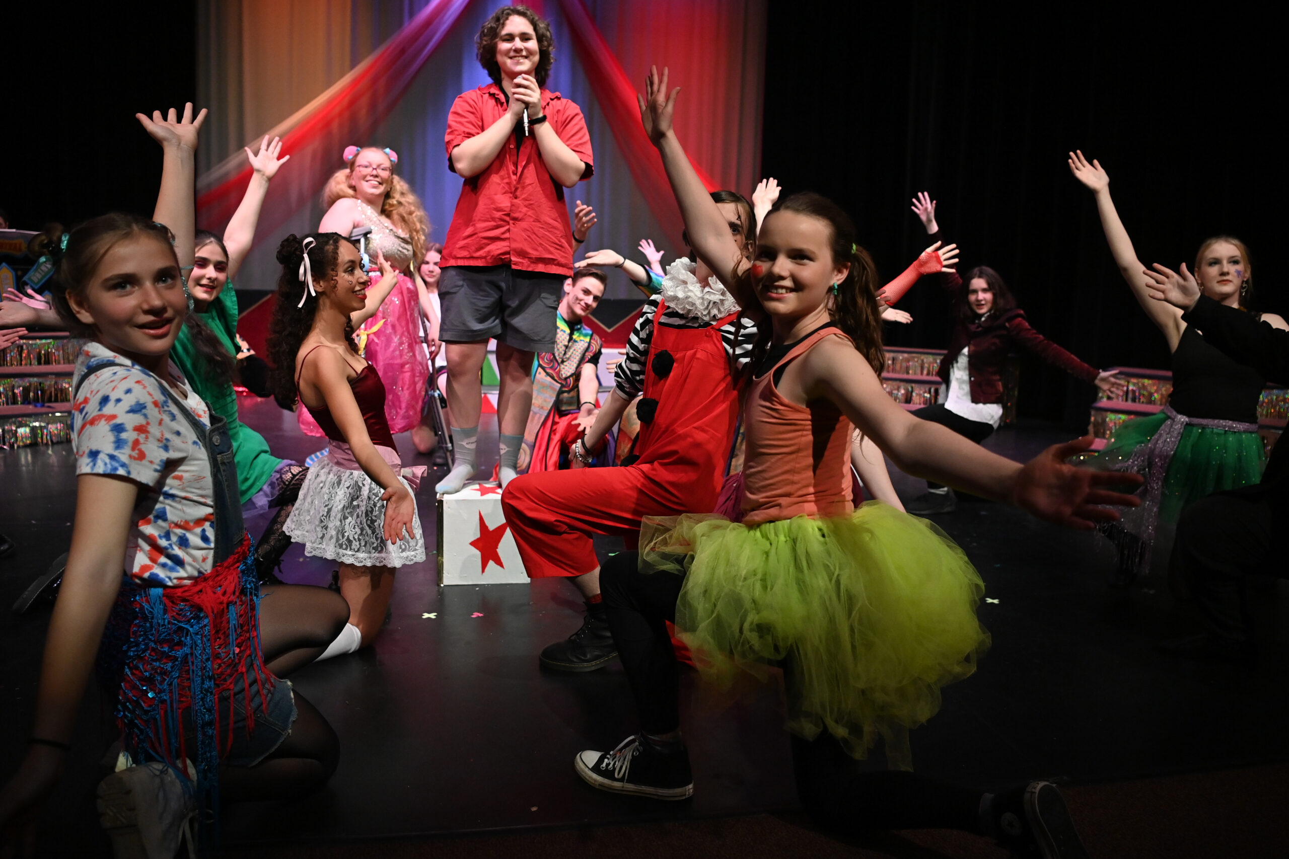 The cast of Godspell performs.