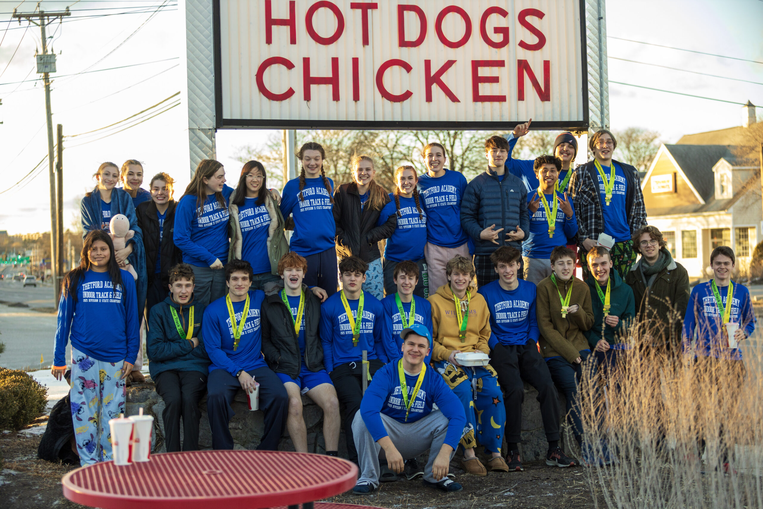 TA's Indoor Track and Field team celebrates at Al's French Fries after the State Meet.