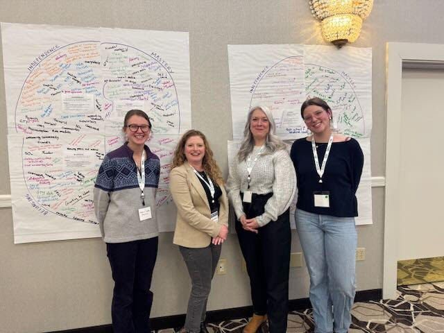 Thetford Academy students Mavis Downey and Hanae Debo pose with Vermont's Getting to Y leadership at the New Hampshire kickoff event.