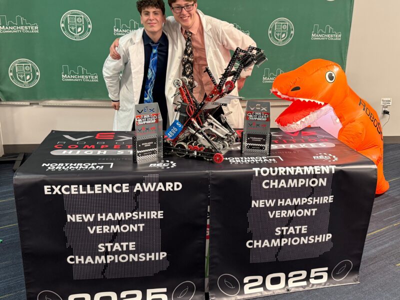 Duncan MacPhee and Connor Kutter-Walker pose with their trophies at the VT/NH VEX Robotics State Championship.